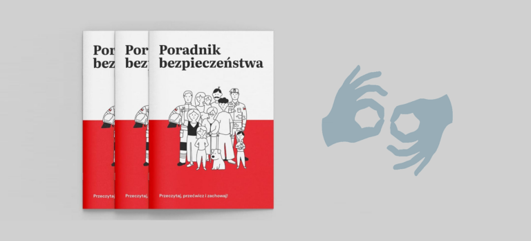 Na szarym tle trzy biało-czerwone okładki Poradnika bezpieczeństwa, obok dwie dłonie w symbolu języka migowego
