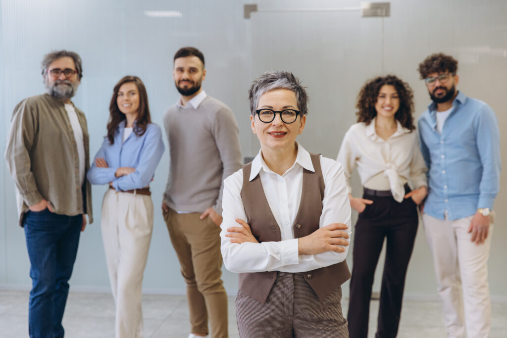 mature woman leading a diverse business team smili 2026 03 08 23 02 44 utc